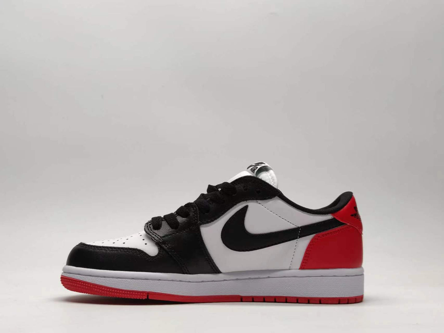 Nike Dunk Low black & white toe