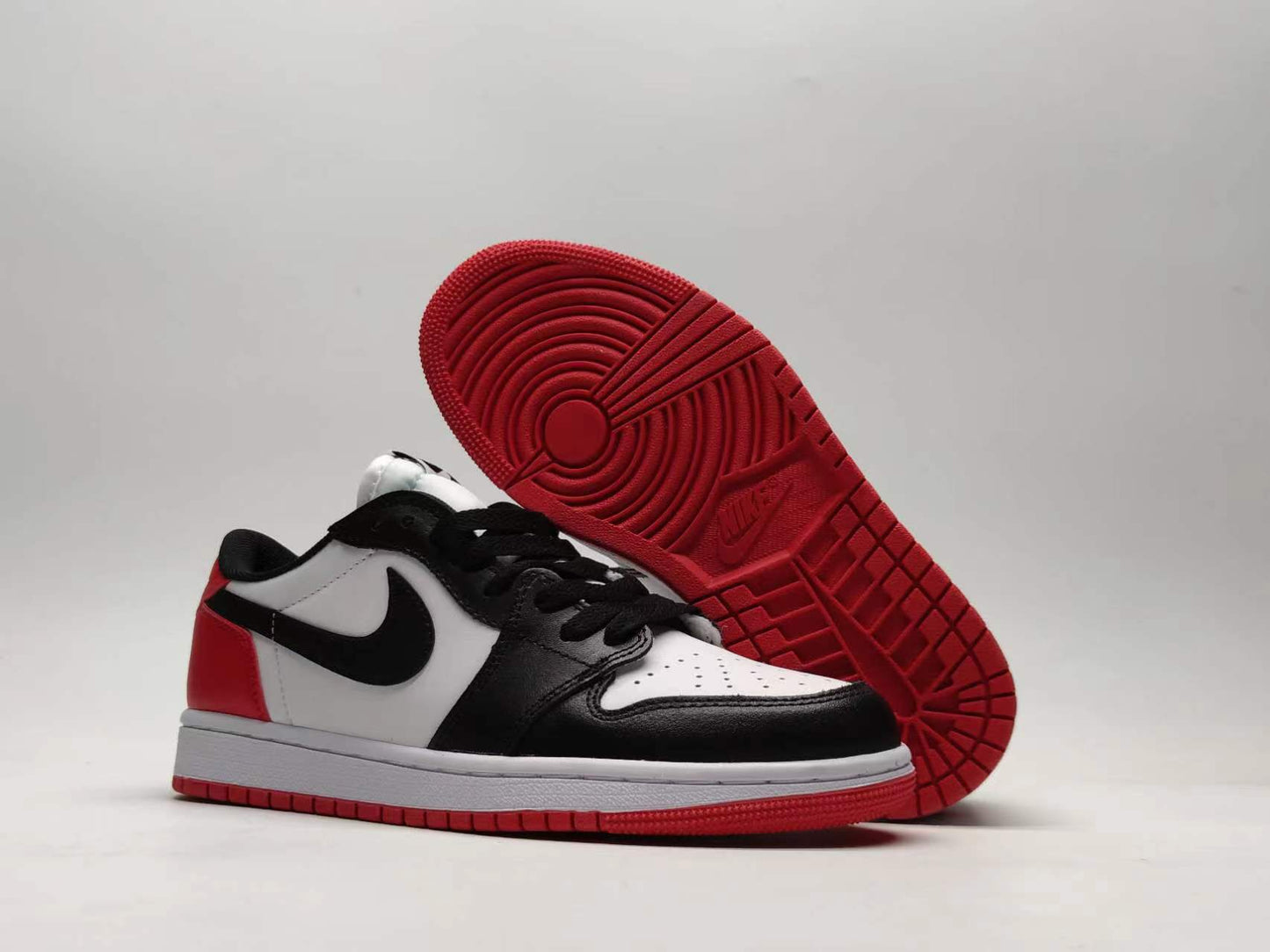 Nike Dunk Low black & white toe
