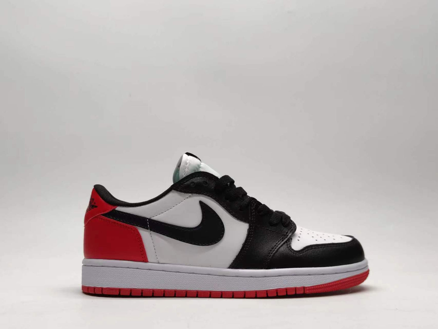 Nike Dunk Low black & white toe